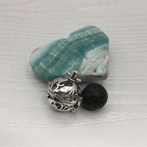 Leaf Pattern Aromatherapy Silver tone Locket.  Lava stone included.